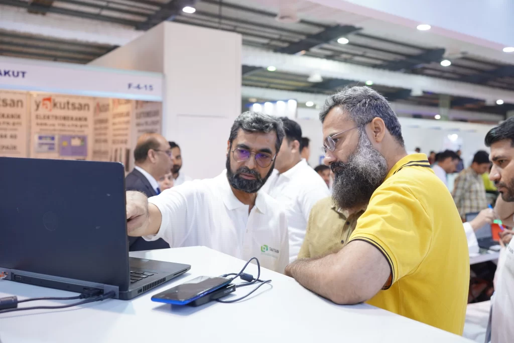 Leaders from top textile companies visiting Ambsan Technologies booth at IGATEX 2025